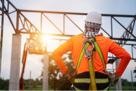 Worker using safety harness during NPORS N404 Safe Working at Height training