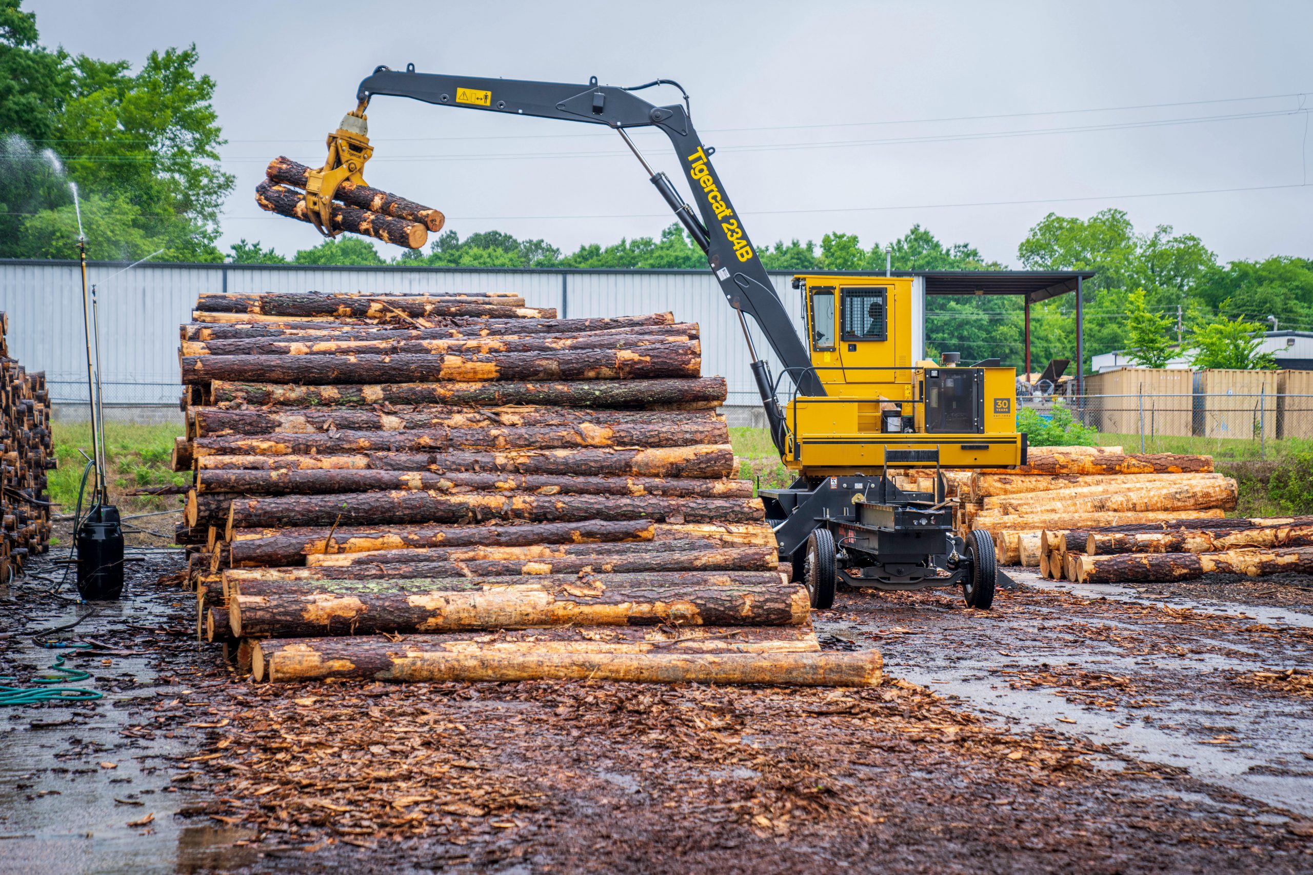 Close-up of log handler grapple lifting timber during NPORS N106 course