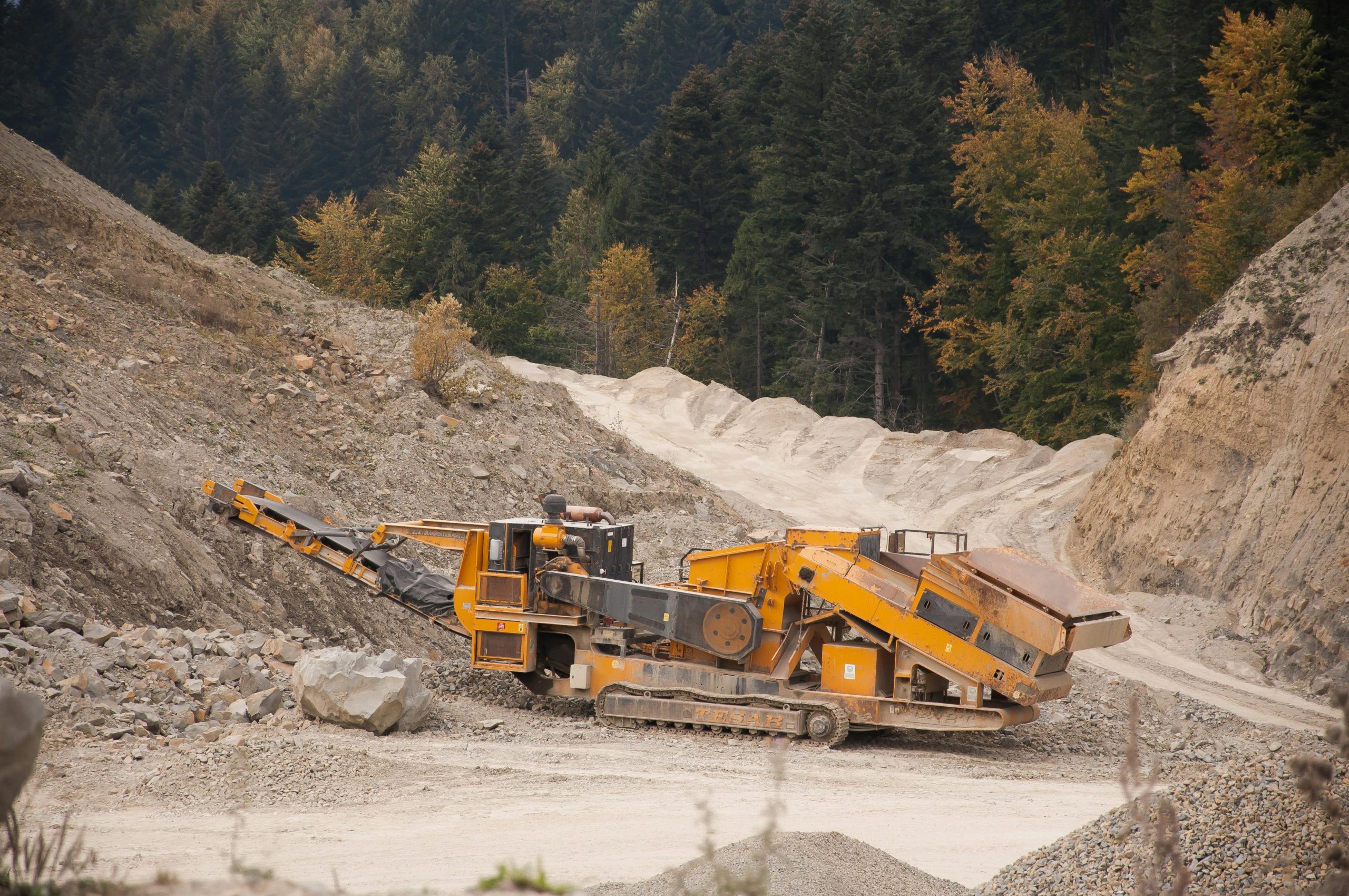 Close-up of crusher machine processing construction material during NPORS N207 course