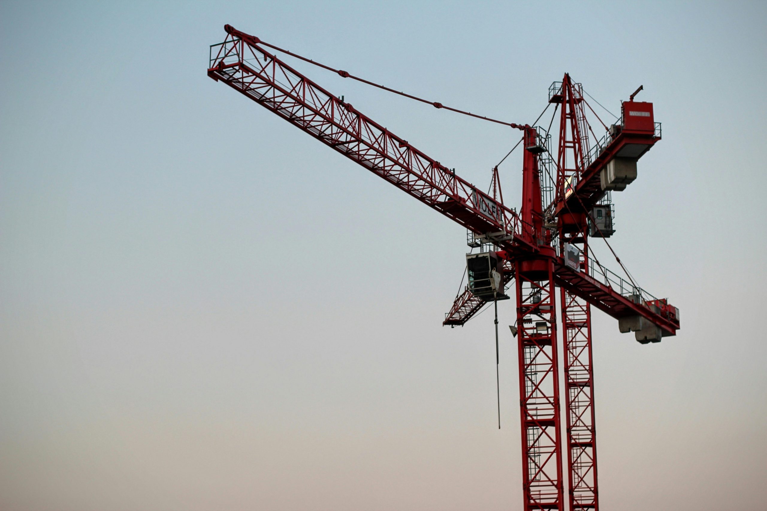 Heavy-duty crane operated by certified professional during CPCS Crane Supervisor A62 training course
