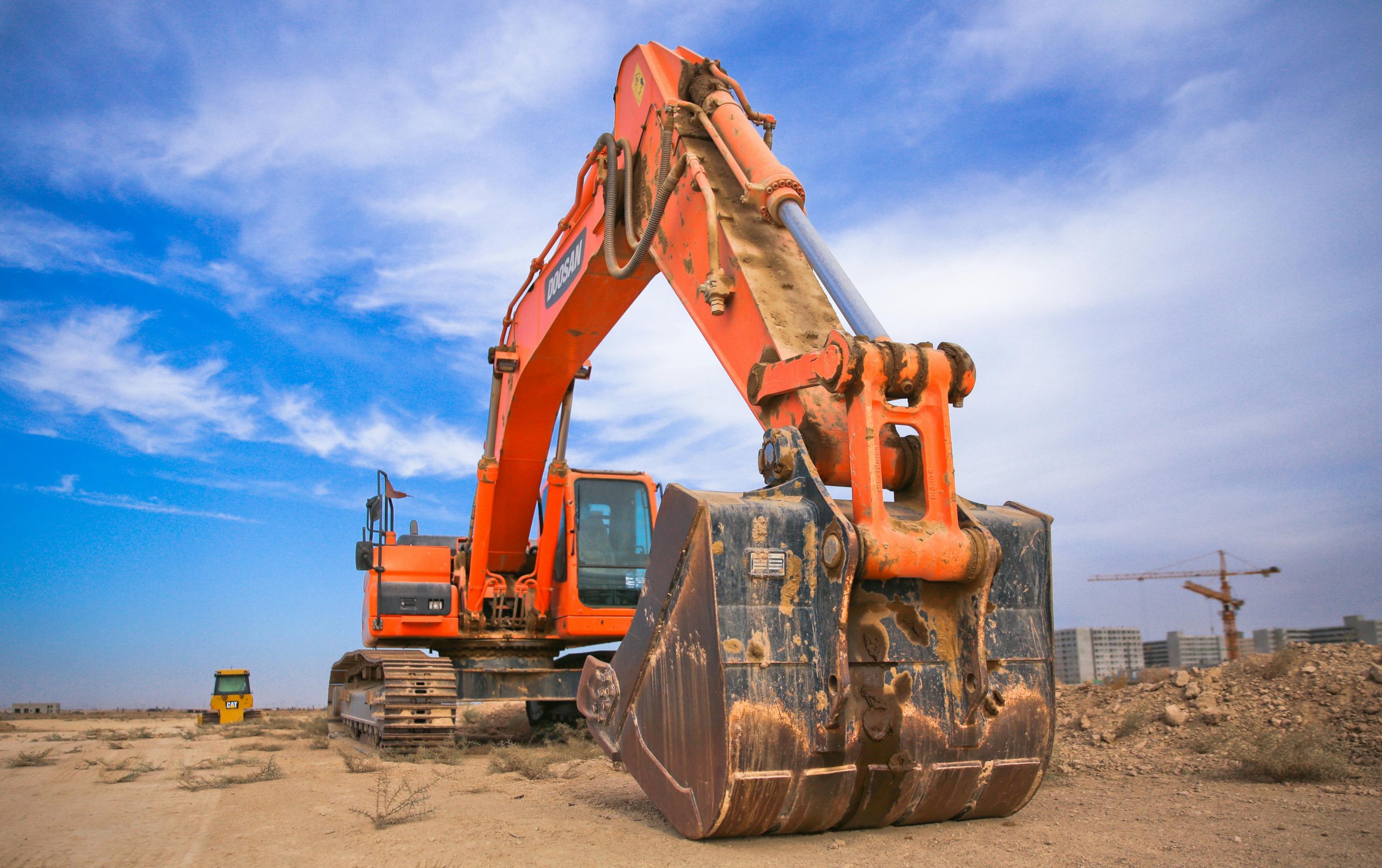 Close-up of Excavator 360 bucket digging soil during NPORS N202 training