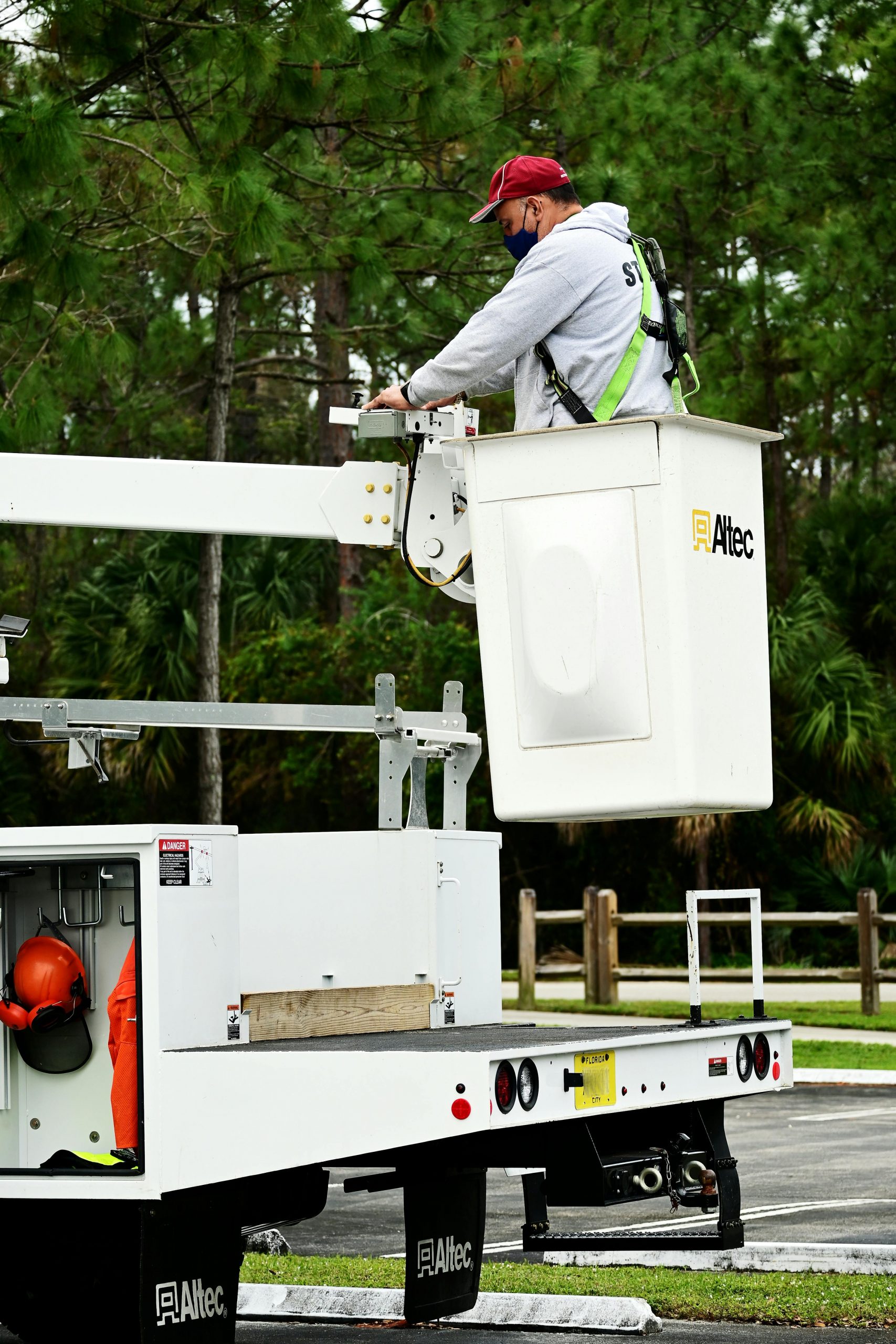 Operator wearing safety harness inside MEWP platform during NPORS N723 course