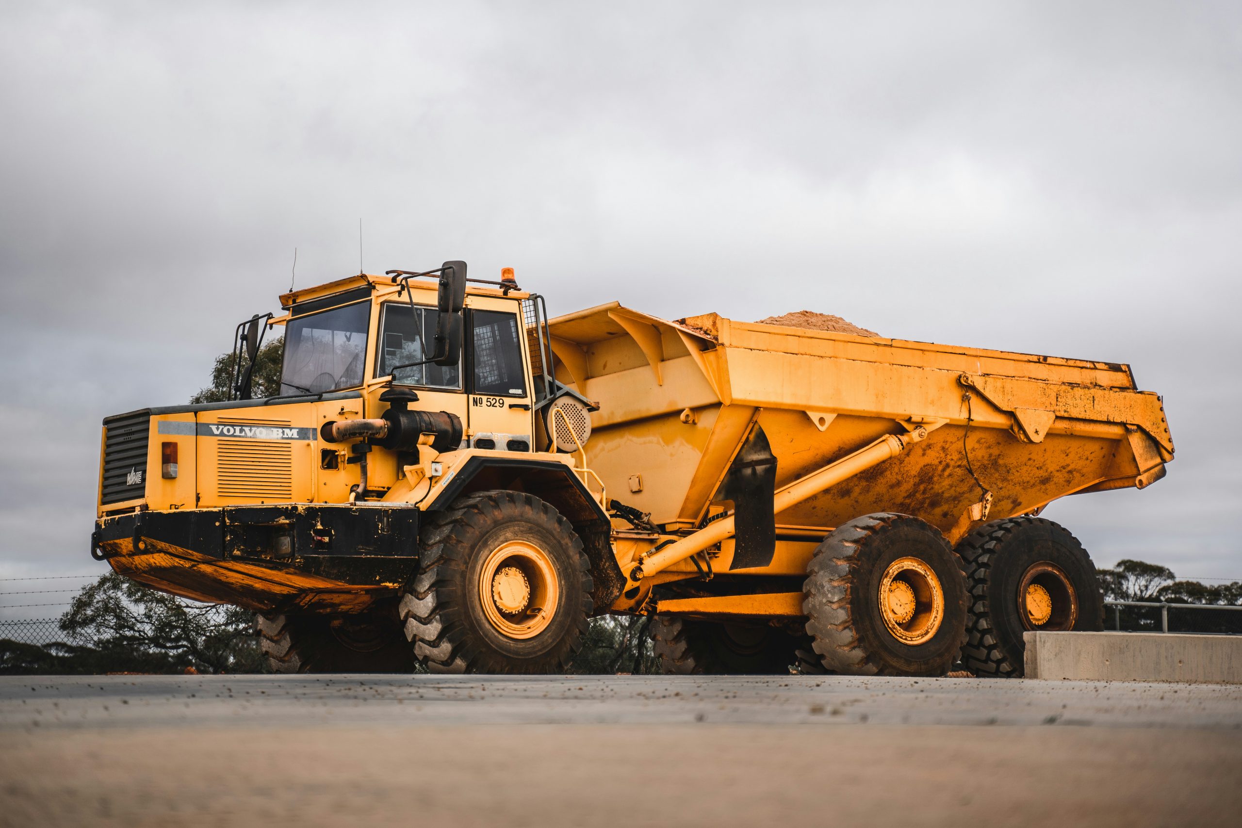 Articulated dump truck in action during CPCS A56 training with certified plant operator