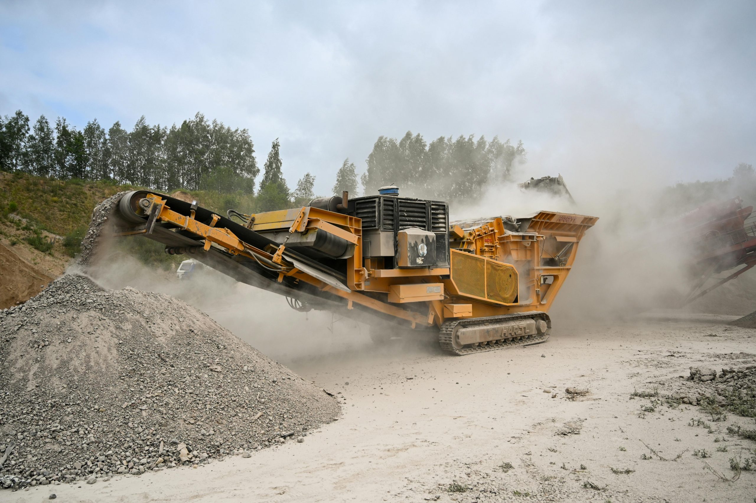 Operator safely operating crusher machine during NPORS N207 training course
