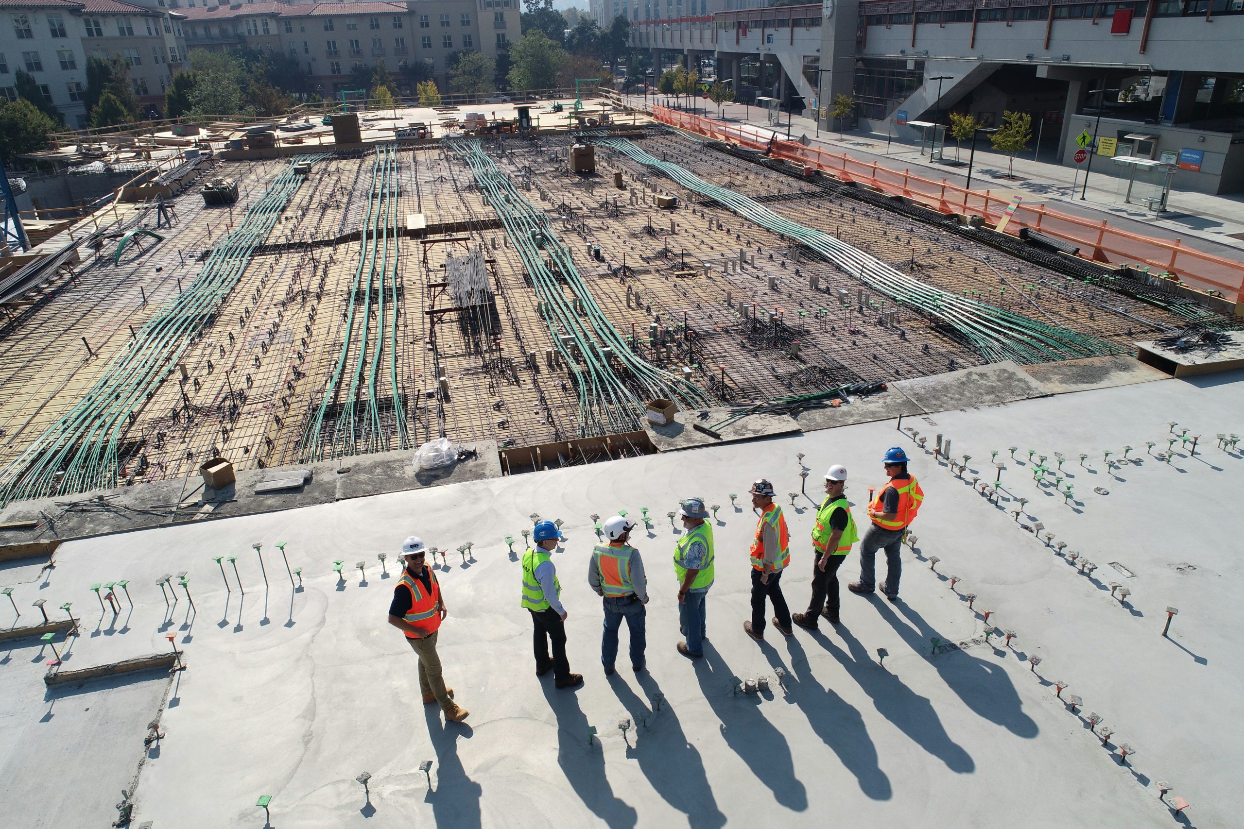 Construction safety manager reviewing updated health and safety regulations during NPORS S032 refresher course